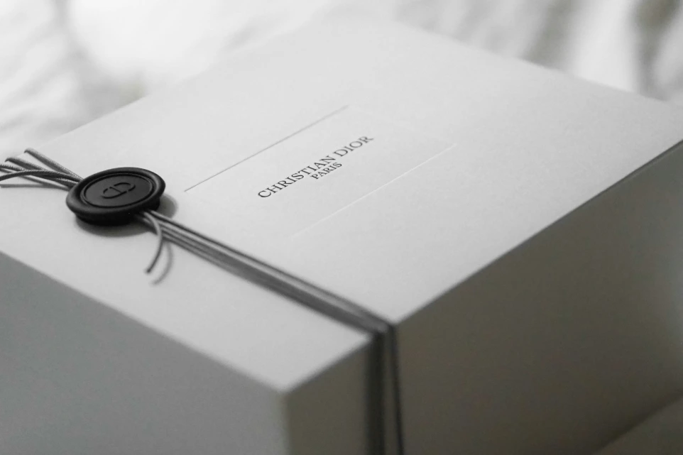 White dior gift box with black wax seal